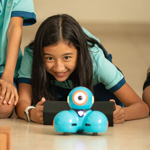 Yangon student operating robot - Nord Anglia Education
